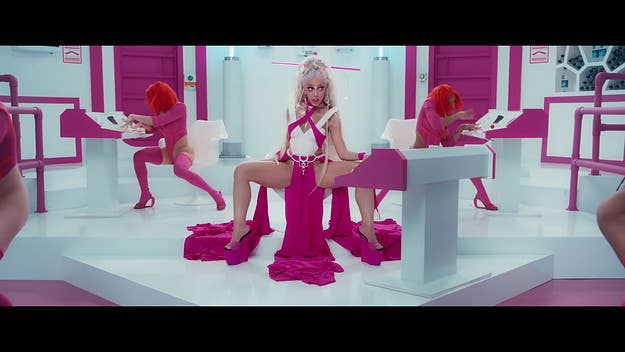 Doja Cat sets off on a rescue mission in space to save her cat in the Mike Diva-directed video for 'Planet Her' highlight “Get Into It (Yuh).”