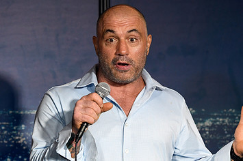 Joe Rogan performs stand-up at a comedy club.