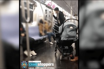 a man slapped a woman on a Brooklyn subway car after she caught him taking photos of other women.
