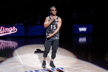 American rapper Lupe Fiasco performs during the game between the Milwaukee Bucks and Sacramento Kings