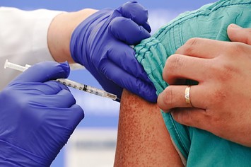 A Florida public health official is put on leave after emailing his staff to urge vaccination.