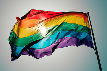 A gay pride flag stock photo via Noberto Cuenca.
