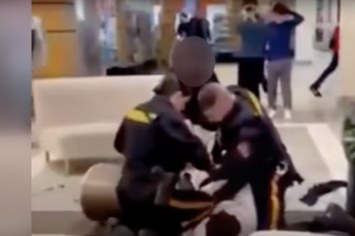 Screenshot of a mall fight between two teens