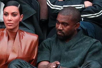 Kim Kardashian and Kanye West attend a 2020 Balenciaga show