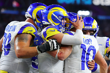 Cooper Kupp #10 of the Los Angeles Rams reacts with Matthew Stafford #9 following a touchdown reception.