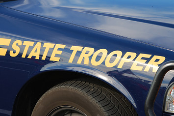 State Troopers stock photo from tfoxfoto via Getty Images.