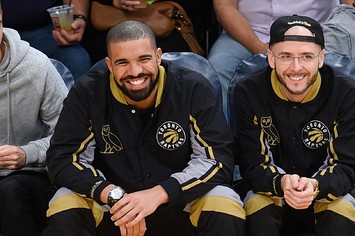 Drake (L) and Noah Shebib attend a basketball game between Raptors and Lakers