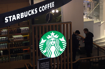 Logo of Starbucks coffee is seen at Galeria Shopping and Entertainment Centre in Russia