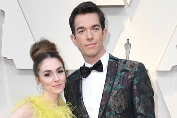 Annamarie Tendler and John Mulaney pose for photo together.