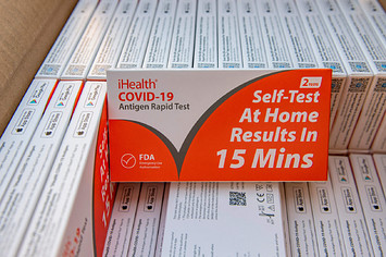 A box of COVID tests is pictured