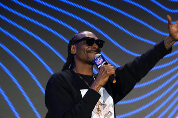 Snoop Dogg speaks during the Pepsi Super Bowl LVI Halftime Show Press Conference.