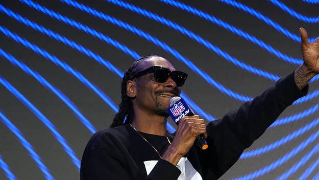 Snoop Dogg is celebrating his new album 'B.O.D.R.' and acquisition of Death Row Records with a new chain that he's wearing during the Super Bowl Halftime Show.