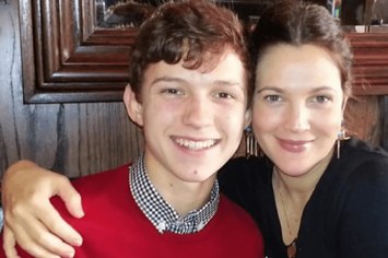 Drew Barrymore and Tom Holland in 2011