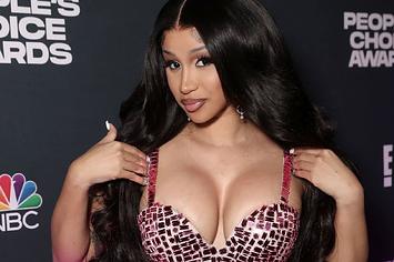 Cardi B poses backstage during the 2021 People's Choice Awards