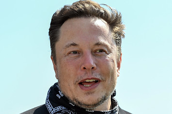 Elon Musk wears a bandana.