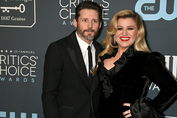 Brandon Blackstock and Kelly Clarkson attend an awards show.