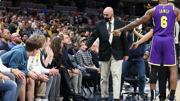 Two fans who were sitting courtside at Wednesday's Lakers game were ejected from Gainbridge Fieldhouse arena after they were pointed out by LeBron.