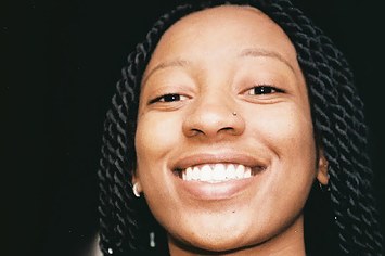 Portrait of WondaGurl smiling in 2021.