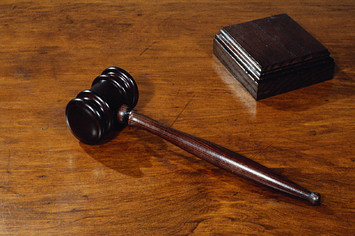 It's an close-up photo of a judge gavel.