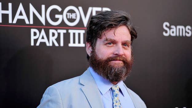 Zach Galifianakis explained to ET why he will deny his involvement in 'The Hangover' trilogy to his two sons, ages 4 and 7, for as long as possible. 