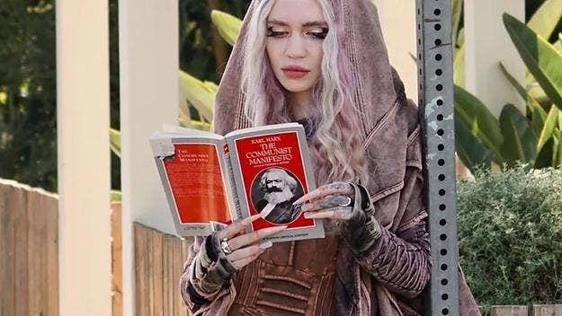 Grimes was photographed reading Karl Marx’s 'The Communist Manifesto,' in what she says was an effort to troll paparazzi that was following her.