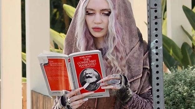 Grimes was photographed reading Karl Marx’s 'The Communist Manifesto,' in what she says was an effort to troll paparazzi that was following her.