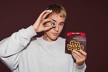 Justin Bieber poses with Tim Hortons Timbiebs