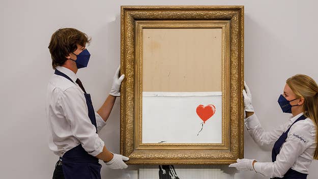 British street artist Banksy's shredded painting "Love is in the Bin," which went viral back in 2018, sold for a record $25.4 million at a Sotheby's auction.