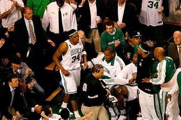 Paul Pierce #34 of the Boston Celtics returns to the court.