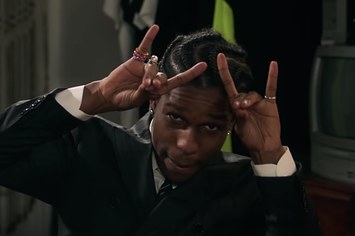 ASAP Rocky gives the horns.