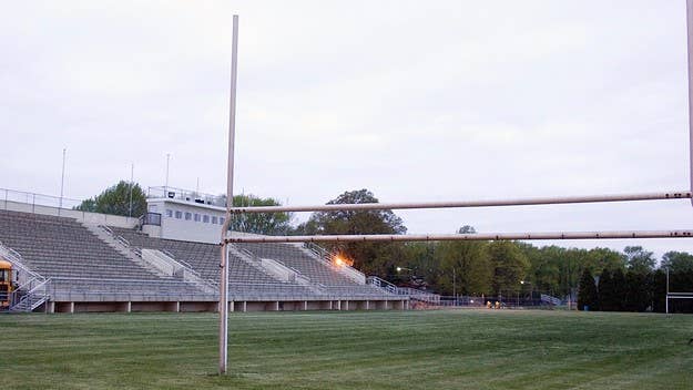Brunswick High School has fired its head football coach after a student athlete allegedly had a sex toy forced into his mouth during a retreat.