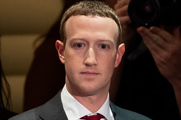Mark Zuckerberg wears a suit.