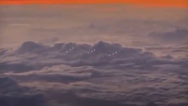 The video, reportedly filmed on Nov. 24, shows a three sets of light formations flying over the South China Sea. "That is some weird sh*t," the pilot says.