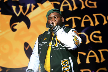Raekwon performs in front of fans.