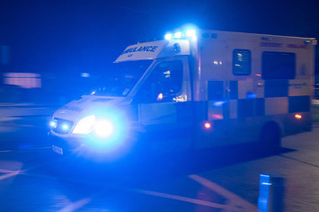 Flashing lights from ambulance.