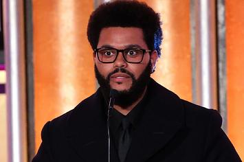 The Weeknd accepts The Quincy Jones Humanitarian Award onstage during the Music in Action Awards Ceremony