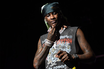 Young Thug performs onstage at festival event.