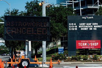 A street sign showing the cancellation of the AstroWorld Festival at NRG Park