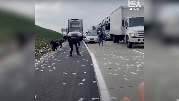 The incident occurred Friday morning on Interstate 5 in Carlsbad, California. Police say they arrested a man and woman on suspicion of taking some of the money.