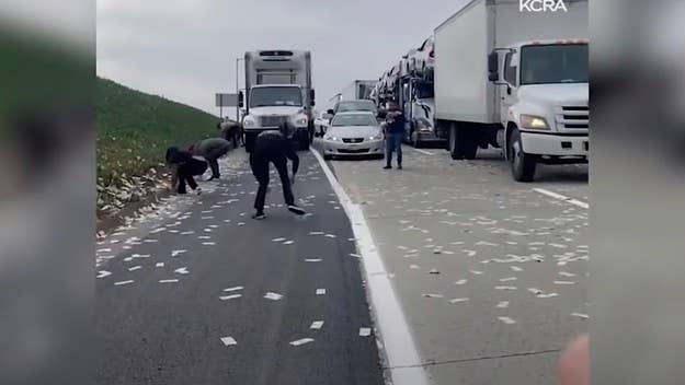 The incident occurred Friday morning on Interstate 5 in Carlsbad, California. Police say they arrested a man and woman on suspicion of taking some of the money.