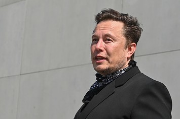 Tesla CEO Elon Musk and Armin Laschet