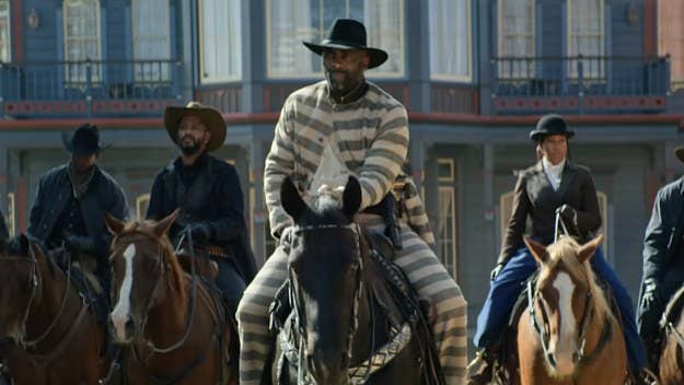 Jonathan Majors, Idris Elba, Zazie Beetz, Regina King, and more star in the upcoming Western from Netflix. The latest glimpse features a Jay and Cudi tease.