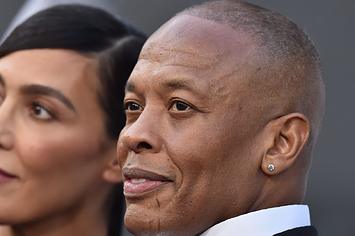Dr. Dre with Nicole Young at 'The Defiant Ones' premiere