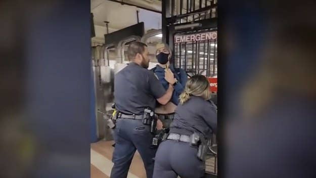 New York City Mayor Bill de Blasio voiced concern over a video that shows two unmasked police officers forcibly removing a masked subway commuter.