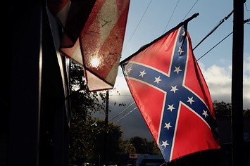 A confederate flag hangs outside a home in the Borough of Yoe in York County