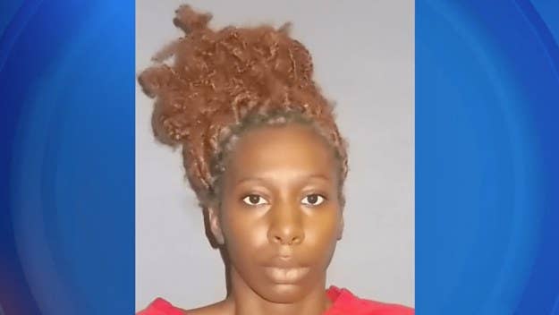 A North Carolina woman is accused of stealing a Good Samaritan's car with his children inside, after he pulled over to assist her in her own car crash