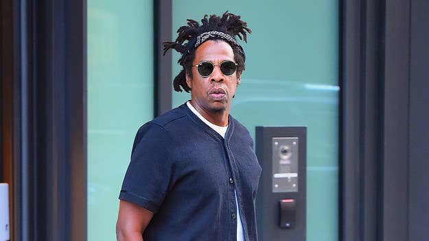 Jay-Z and his legal team hired a former cop to take photos of Parlux's ex-CEO Donald Loftus to be used as evidence in an $18 million fragrance lawsuit.