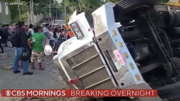 Sources say more than 250 people were crammed into the truck when it crashed into the base of a pedestrian bridge. At least 52 people were injured.