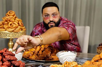 DJ Khaled eating chicken wings in his new Instagram video for his new wing restaurant Another Wing.