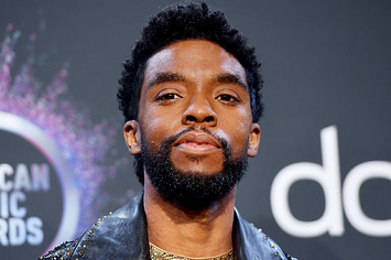Chadwick Boseman poses in the press room during the 2019 American Music Awards at Microsoft Theater.
